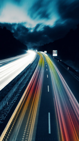 Long exposure highway traffic night - a cloudy sky free wallpaper