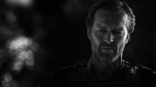 Man armor serious look shoulders - his face and shoulders free wallpaper
