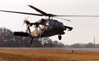 Helicopter flying low field grass - blender free wallpaper