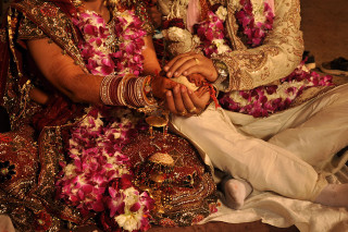 Couple sitting floor flowers man - detail free wallpaper