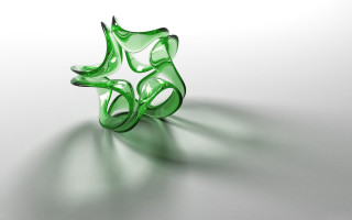 Green glass object white table - a white wall free wallpaper
