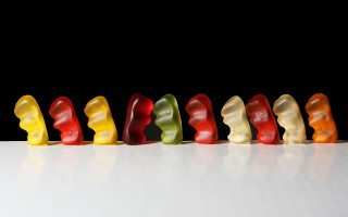 Colorful gummy bears table white - top of a table next free wallpaper