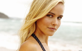 Woman blonde hair beach ocean 2 - a beach near the ocean free wallpaper