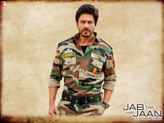 Man camouflage shirt posing picture - his hands in his pockets free wallpaper