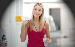 Woman red top holding cup - a cup free wallpaper