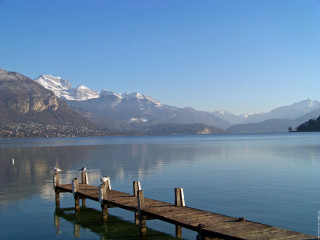 Pier birds water mountains lake - a mountain range in the background free wallpaper