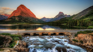 Bridge waterfall river mountains sunset - a bridge over a river free wallpaper