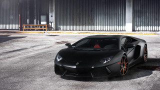 Black sports car parking lot 3 - a parking lot next free wallpaper