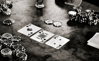 Table cards dices person holding - a person holding free wallpaper