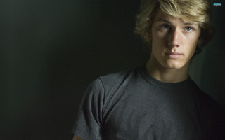 Blonde man black shirt serious 3 - beautiful bone structure free wallpaper
