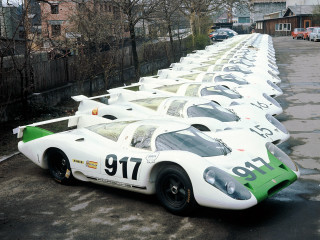 Race cars parking lot fence - a parking lot next free wallpaper