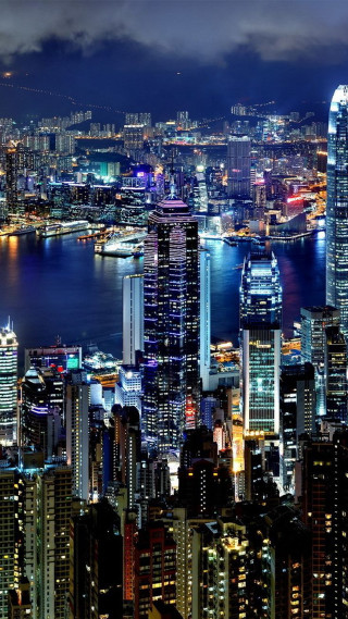 City skyline night lights water - free city wallpaper