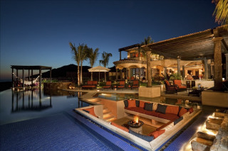 Pool couch firepit night ocean - luxury free wallpaper