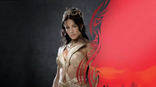 Woman gold dress red background - a gold dress free wallpaper