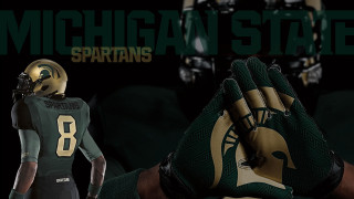 Football player green gold michigan 2 - a football player free wallpaper