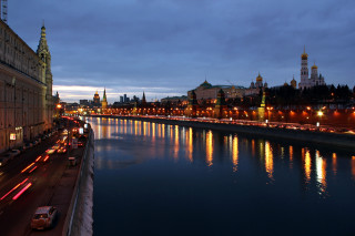 River cars nighttime buildings lights - car free wallpaper