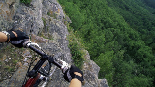 Person riding bike rocky trail - a person riding free wallpaper