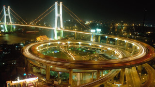 Large bridge city night lights - the other side free wallpaper