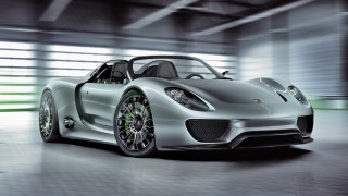 Silver sports car garage green 3 - a white wall behind free wallpaper