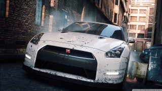 White car driving street tall - a tall building free wallpaper