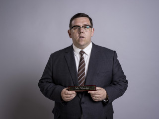 Man suit holding plaque name - a man in a suit holding free wallpaper