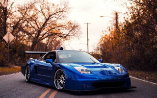 Blue sports car trees street - the side of the road free wallpaper