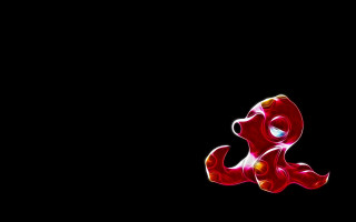 Red object floating black background 2 - a red light in the middle of it free wallpaper