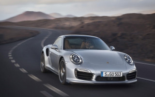 Silver porsche sports car mountains - cloudy free wallpaper