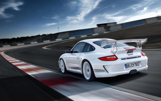 White porsche sports car track 3 - a white porsche sports car free wallpaper