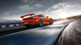Red sports car driving track 2 - a sunbeam free wallpaper