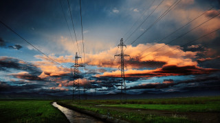 Sunset power lines field road - sky in the background free wallpaper