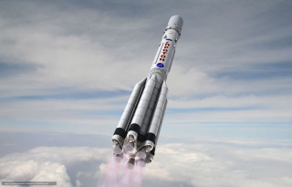 Rocket flying smoke blue sky 2 - a rocket free wallpaper