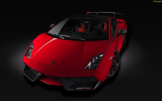 Red sports car dark room 8 - a red sports car free wallpaper