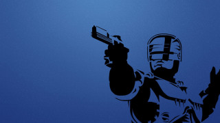 Man holding gun wearing helmet - a glove free wallpaper