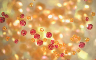 Red yellow beads floating blurry - bead free wallpaper