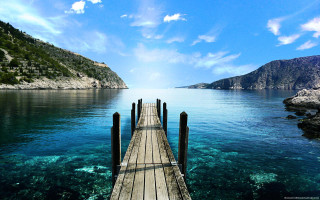 Dock mountain water background foreground - a dock in the foreground free wallpaper
