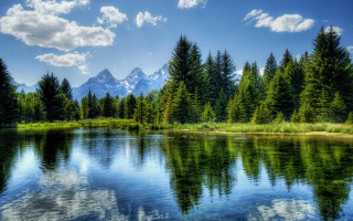 Lake trees mountains blue sky 21 - cloud and sun free wallpaper