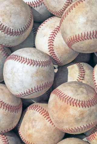 Baseballs pile table top view - free sports wallpaper