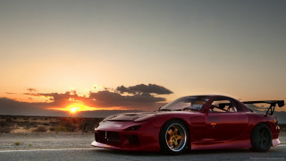 Red sports car sunset road 2 - the sun in the background free wallpaper