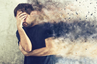 Man holding head smoke coming - liminal free wallpaper