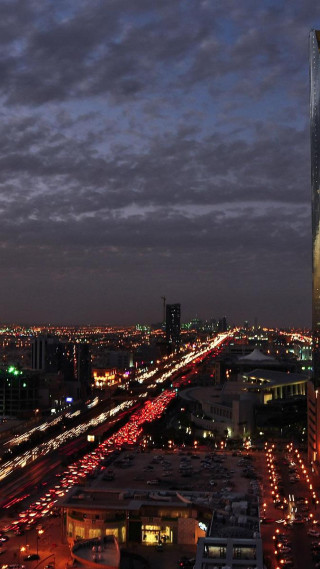 City skyline tall building night - car free wallpaper