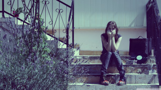 Woman sitting stairs hands face - a set of stairs free wallpaper