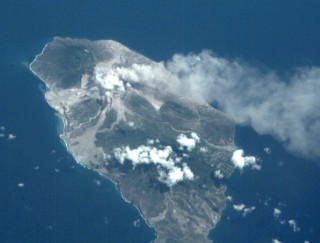 Small island ocean clouds plane - a small island in the middle of the ocean free wallpaper