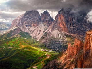 Mountain range valley road cloudy - the distance free wallpaper