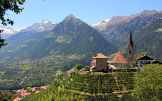 Church hill valley mountains snow 2 - a view of a valley and mountains free wallpaper