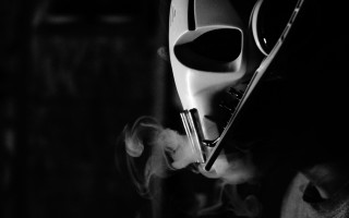 Masked smoker dark room cigarette - video art free wallpaper