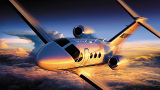 Small airplane flying sunset clouds 2 - a sunset free wallpaper
