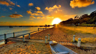 Boat sandy beach ocean sunset 2 - sandy free wallpaper