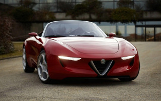 Red sports car driving road 2 - a building and trees free wallpaper