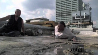 Man woman laying ground building - the ground in front free wallpaper